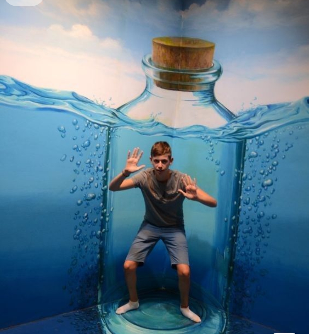 man trapped inside a water bottle