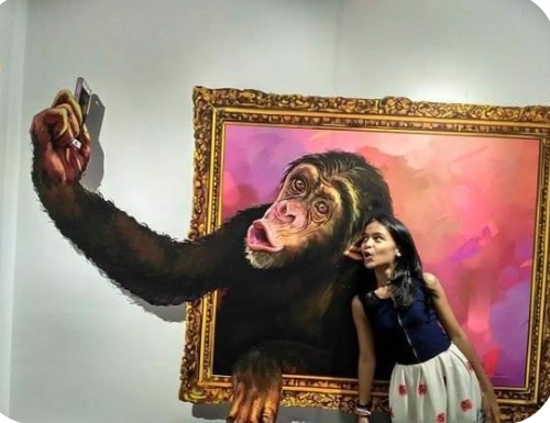 Attractive painting ape with girl 